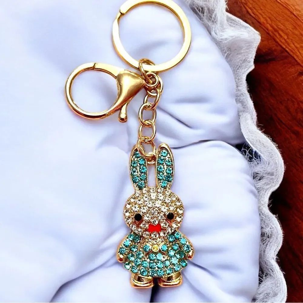 ⭐️3/$25⭐️ White and Teal Rhinestone Bunny Gold Tone Keychain